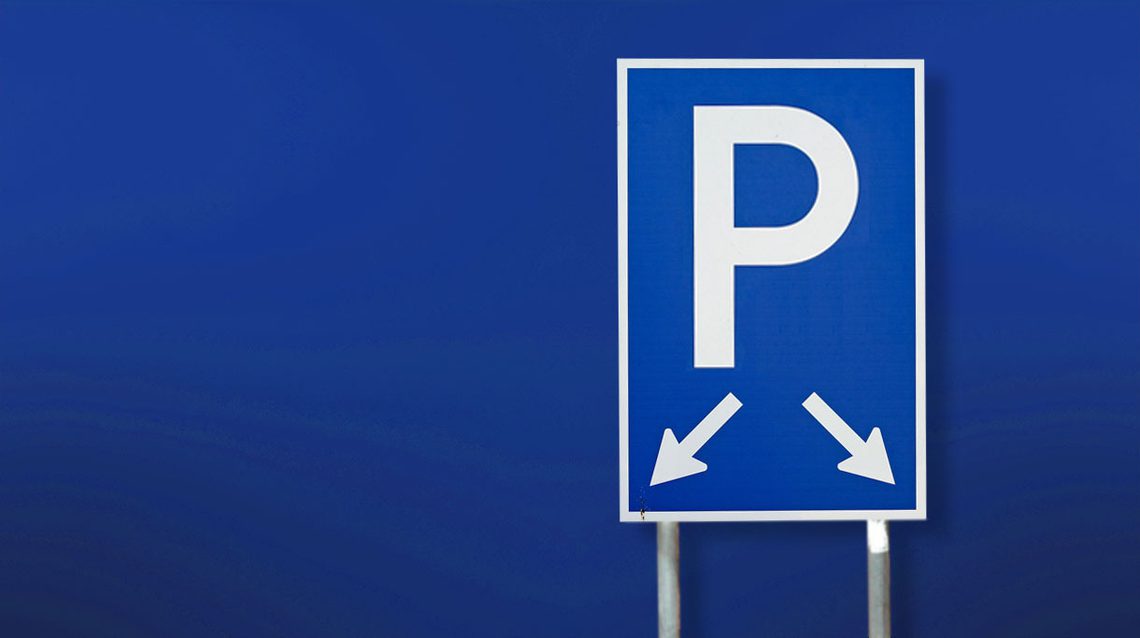 A parking sign on a blue gradient background