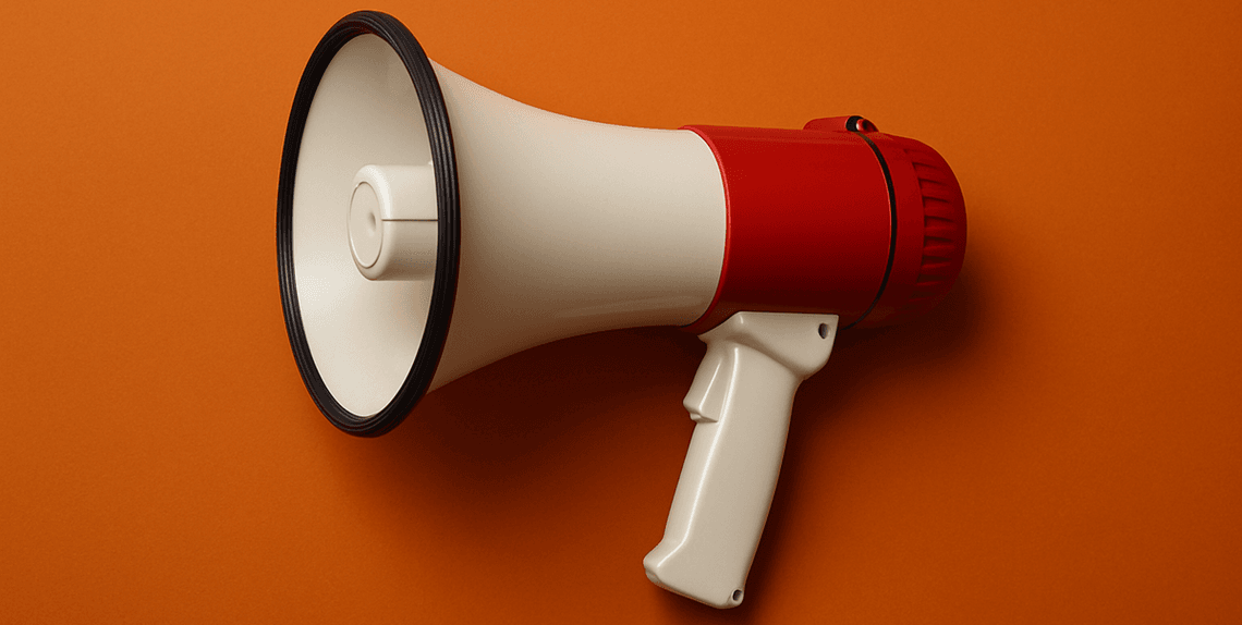 A photo of a megaphone on an orange background
